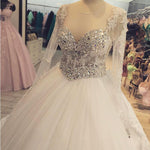 Afbeelding in Gallery-weergave laden, Sheer Long Sleeves Crystal Beaded Ball Gowns Wedding Dresses Lace Appliques
