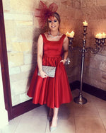 Cargar imagen en el visor de la galería, Elegant Bow Back Satin Spaghetti Straps Bridesmaid Dresses Tea Length
