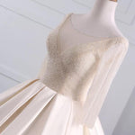 Afbeelding in Gallery-weergave laden, Sequins Beaded V Neck Champagne Wedding Dresses Ball Gowns With Sleeves
