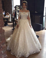 Cargar imagen en el visor de la galería, Illusion Neckline Long Sleeves Lace Wedding Dresses Ball Gowns
