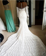 Load image into Gallery viewer, Skin Color Tulle Neck Long Sleeves Lace Mermaid Chapel Train Wedding Dresses
