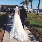 Load image into Gallery viewer, Elegant Backless Lace V-neck Mermaid Wedding Dresses
