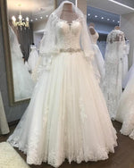 Load image into Gallery viewer, A-line Crystal Beaded Sashes Lace Appliques Long Sleeves Tulle Wedding Dresses
