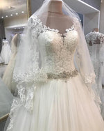 Load image into Gallery viewer, A-line Crystal Beaded Sashes Lace Appliques Long Sleeves Tulle Wedding Dresses
